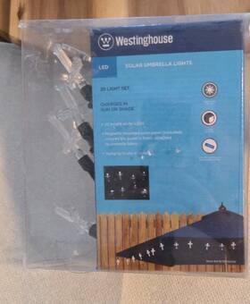 Westinghouse 756233002389 Solar Umbrella String Light. Cross Shape. New In Box Westinghouse 756233002389 Solar Umbrella String Light. Cross Shape. New In Box