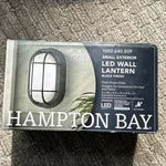 Hampton Bay Outdoor Led Wall Lantern Frosted Stripe Glass Black Finish. Fixed Price $12.00.