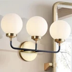 Jonathan JYL9058B Caleb 22 In. 3-LIGHT Wall Sconce Black/brass. Fixed Price $59.99.