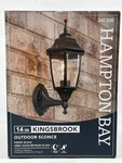 Hampton Bay 14 In. 1-LIGHT Black Hardwired Dusk-to-dawn Outdoor Wall Lantern. Fixed Price $44.99.
