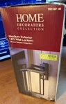 New Home Decorators Mauvo Canyon 15.5 In. Black Dusk Dawn Led Outdoor Wall. Fixed Price $67.99.