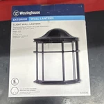 Westinghouse Exterior Wall Lantern Textured Black Cast Aluminum White Lens 66898. Fixed Price $10.00.