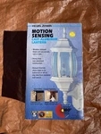 Heath Zenith SL-4196-WH White Motion Sensing Cast Aluminum Lantern. Fixed Price $35.99.