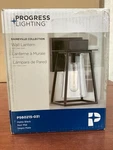 New Progress Raineville 1-LIGHT 8.75IN Matte Black Outdoor Wall Lantern B110. Fixed Price $13.58.