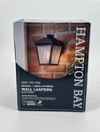 Hampton Bay Malena 1-LIGHT Outdoor Wall Lantern Black Finish Clear Seeded Glass. Fixed Price $21.00.