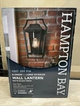 Hampton Bay Elsmere 16 In. Matte Black 1-LIGHT Outdoor Line Voltage Wall Sconce. Fixed Price $35.99.