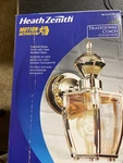 Heath Zenith HZ-4170-PB Farmhouse Brass Outdoor Light With Clear Beveled Glass. Fixed Price $61.99.