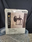 Portfolio Outdoor Wall Lantern Matte Black Finish And Clear Glass 4.7X6.1X8.25". Fixed Price $10.00.