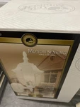 Hampton Bay Alexandria Outdoor Motion-sensing Wall Lantern White Finish 248617. Fixed Price $52.00.