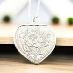 Vintage Sterling Silver 1 Troy Ounce Heart Coin Pendant Necklace. Fixed Price $199.00.