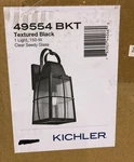 Kichler Tolerand 1-LIGHT Textured Black Outdoor Wall Mount Sconce Seeded Glass. Fixed Price $199.99.