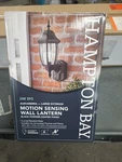 Hampton Bay Alexandria 17.3 Dusk-to-dawn Motion Sensing Lantern HBI-4192-BK. Fixed Price $66.49.