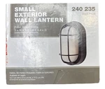 Hampton Bay Exterior Wall Light 240 235 Black Oval, Frosted Ribbed New Open Box. Fixed Price $17.99.