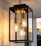 16'' Exterior Hanging Fixture 3-LIGHT, Black And Brass Outdoor Pendant Lan. Fixed Price $387.04.