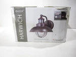 Vaxcel One Light Motion Sensor Outdoor Wall Sconces - Harwich Dualux 8.25". Fixed Price $69.94.