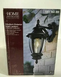 Home Decorators Collection Medium Wilkerson 1-LIGHT Black Outdoor Wall Mount. Fixed Price $54.99.