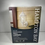 Hampton Bay White Dusk Dawn Decorative Outdoor Wall Lantern Sconce 14". Fixed Price $29.64.