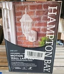 Hampton Bay Alexandria Motion-sensing Decorative Lantern White Wall Mount Read. Fixed Price $19.00.