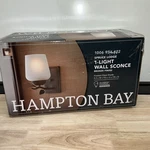 Hampton Bay Spruce Lodge Pinecone 1-LIGHT Wall Sconce. Fixed Price $44.99.
