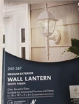 Hampton Bay White Decorative Outdoor Wall Lantern. Fixed Price $37.99.