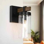 Lnc 1-LIGHT Black Wall Sconce W/ Seeded Glass Shade & Faux Wood Accents. Fixed Price $29.95.
