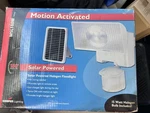 Cooper Lighting Motion Activated Solar Powered Halogen Floodlight. Fixed Price $49.95.