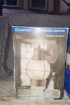 The Hampton Rustico Lantern Is Caged Nautical-style Outdoor Wall Fixture.... Fixed Price $39.99.