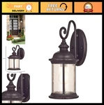 One-light Outdoor Wall Lantern, Steel Frame, Clear Seeded Glass, Black & Bronze. Fixed Price $73.99.