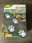 Led Solar Paw Print Lights Set Of 4 Decorative Garden Ideaworks New. Fixed Price $24.99.