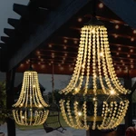 Lewis&wayne Hanging Solar Chandelier Outdoor 30 Cool White Lights Acrylic Clear. Fixed Price $53.61.