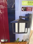 Home Decorators Mauvo Canyon Led Dusk-to-dawn Photocell Wall Lantern Black. Fixed Price $51.84.