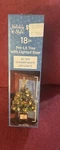 Holiday Style 18" Pre-lite Tree Lighted Base 45 Tips 14 White Led Lights. Fixed Price $16.00.