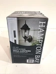 Hampton Bay 14.5 In. 1-LIGHT Oil-rubbed Bronze Outdoor Dusk-to-dawn Wall Lantern. Fixed Price $39.99.