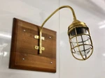 Marine-inspired Bulkhead Wall Light Extended Arm Fixture Ideal For Exteriors. Fixed Price $120.00.