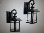 Jazava Black Outdoor Hardwired Wall Lantern Sconce With Clear Seeded Glass 2PK. Fixed Price $63.96.