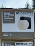 Black Hardwired Indoor Outdoor Wall Lantern Sconce With Opal Glass Globe. Fixed Price $50.00.