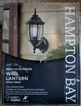 Hampton Bay 1-LIGHT Black Finish Medium Exterior Wall Lantern Open Box. Fixed Price $24.99.