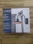 Lutec 12" Wall Light 1200 Lumens Dusk To Dawn Sensor Matte Black New 3000K Color. Fixed Price $39.95.
