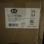 Homenhancements 60W Coach Medium 1-LIGHT Clear Seeded Glass Matte Black. Fixed Price $33.54.