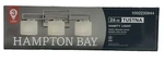 Hampton Bay Tustna 26 In. 3-LIGHT Brushed Nickel Bathroom Vanity W Shade. Fixed Price $56.99.