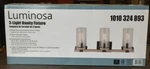 Luminosa 24 In. 3-LIGHT Grey Wood Finish Vanity With Clear Seeded Glass. Fixed Price $47.49.