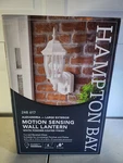 Hampton Bay Alexandria 180 White Motion-sensing Outdoor Decorative Wall Lantern. Fixed Price $61.99.