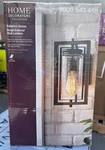 Home Decorators Palermo Grove 6-1/2 In. 1-LIGHT Gilded Iron Outdoor Wall Lantern. Fixed Price $44.00.
