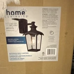 Home Luminaire Outdoor Wall Lantern Black Seeded Glass Model 30812041. Fixed Price $38.98.