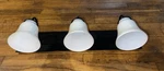 Hubbardton Forge Triple Wall Mount Light Fixture. Fixed Price $350.00.