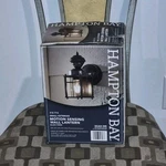 Hampton Bay Outdoor Motion Sensing Wall Lantern Black Hardwired 418 916. Fixed Price $25.00.