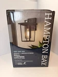 Hampton Bay Keswick Modern 1-LIGHT Matte Black Hardwired Outdoor Wall Sconce. Fixed Price $52.00.