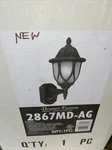 Designers Fountain Autumn Gold 1 Light 6.5IN. Cast Wall Lantern Motion Detector. Fixed Price $35.00.