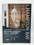 Hampton Bay Alexandria 17.3 In. Motion Sensing Dusk-to-dawn Outdoor Wall Lantern. Fixed Price $34.99.